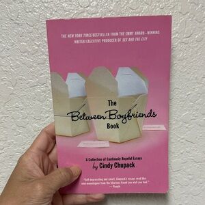 The Between Boyfriends Book by Cindy Chupack - Pink Cover